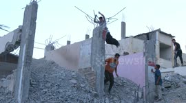 Youngsters in war-torn Gaza do parkour free-running through rubble of destroyed homes