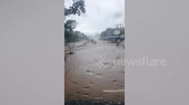 Quarantine checkpoint waterlogged after heavy rain in the Philippines