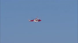 Coastguard helicopter seen training with Sheerness Lifeboat off Kent, UK