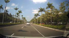 WTF MOMENT: Irresponsible driver loses control and crashes into a lamp post (Dashcam Video)