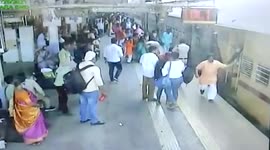 Woman passenger falls under moving train at station, rescued in western India