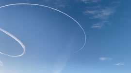 Israeli warplanes draw lines and circles in the sky of the Gaza Strip.