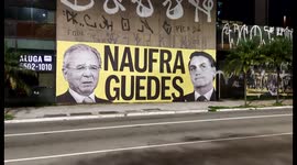Protest poster against Paulo Guedes and Jair Bolsonaro in Sao Paulo, Brazil