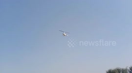 An Indian Groom arrives in a helicopter for his wedding in India