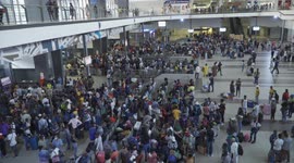 Travellers stuck in Johannesburg after new covid-19 strain identified omicron, travel bans