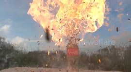 Here's what happens when a Coca-Cola glass bottle full of match heads is lit
