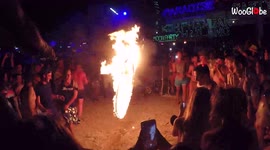 ''You're on Fire... LITERALLY!' TERRIFYING fire hoop jump fail at  full moon party'