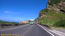RECKLESS DRIVING: Road construction driver speeding on a bend into oncoming traffic (Dashcam Video)