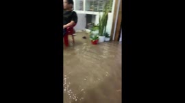 Severe flooding hits eastern Vietnam inundating businesses and homes