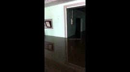 Trapped woman films her flooded house as she awaits rescue in Vietnam