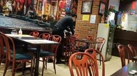Staff sanitizer every table after customers gone and every table has hand sanitizer at Chinese restaurant, Gourmet Kitchen