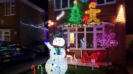 Residents officially switch on their street's annual Christmas lights in West Yorkshire