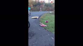 'Toddler's first-ever bike jump attempt ends with an EPIC grass face plant '