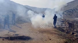 Palestinian protesters and Israeli security forces clash following demonstration against settlements in the village of Beit Dajan