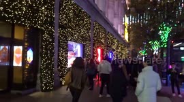 Rounds of applause installation at Selfridges with Christmas shopping in full swing on Oxford Street