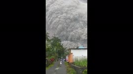 Vast ash cloud towers over village as Indonesia's Mount Semeru erupts