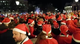 Hundreds of Santas gather in London's Trafalgar Square on Saturday night
