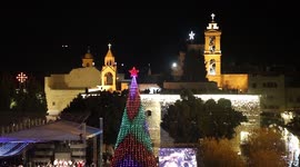 Bethlehem's famed Manger Square Christmas tree lit up