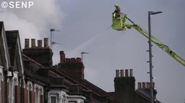 15 fire engines and 100 firefighters tackle blaze at car workshop in Walthamstow