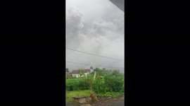 Wall of ash looms over Indonesian village as Mount Semeru erupts