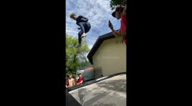 Daredevil pulls off dangerous stunt by trampolining off cliff into river