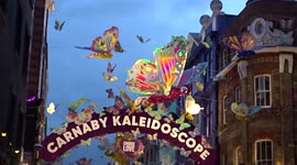 Crowds of visitors admire Carnaby Christmas Kaleidoscope in London's Soho
