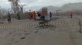 Land surrounding Mount Semeru covered in blanket of ash as volcano erupts again