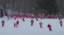 Hundreds of Santas hit ski slopes for a good cause