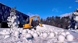 Chinese hotel uses diggers to build more than 100 snowmen