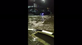 Torrential rain leaves Indonesia city streets submerged by floodwater