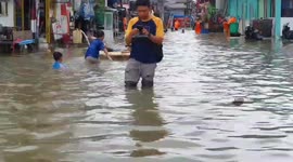 Hundreds of homes flooded in Indonesian capital after heavy rain