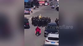 Chinese officials confiscate sugarcanes to stop elderly vendor from selling goods in middle of road