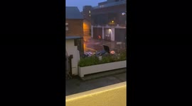 Watch as man jet washes his paths and pavement in the midst of Storm Barra in Dublin
