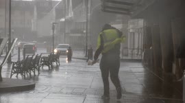 People nearly blown over as Storm Barra hits Wales, UK, with high winds and intense rain