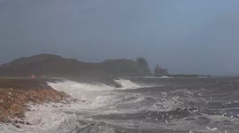 Watch seagulls riding huge waves near Dublin as Storm Barra hits the Irish coast at high tide