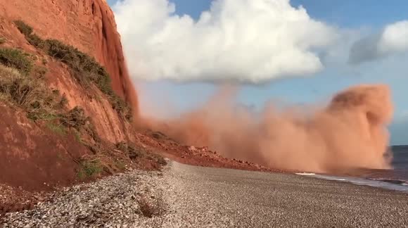 'That's incredible!' Dramatic moment HUGE section of cliff crashes onto popular UK beach