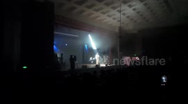 High School Students and Teacher singing Hallelujah at Christmas concert.