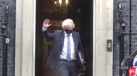 Under fire UK PM Boris Johnson leaves 10 Downing Street ahead of PMQs