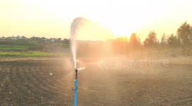 Sprinkler water system artificial rain on fields