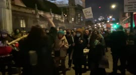Kill The Bill and Extinction Rebellion protesters play drums outside the Parliament, London, UK 08 December 2021.