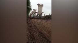 Concrete pillar collapses during high-speed track demolition in Indonesia