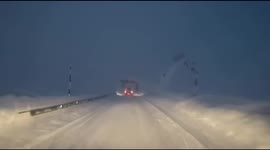'Holy sh*t!' Avalanche crashes onto car as motorist drives over mountain road in Spain