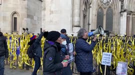 Protesters gather outside the High Court as the US Government wins its appeal to extradite Julian Assange, London, UK 10 December 2021