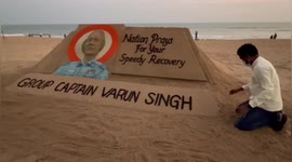 Pray message through sand about Group Captain Arun Singh recovery