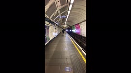 London Underground Train stopping in the station