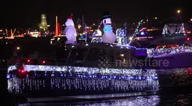 Christmas boat parade lights up Newport Beach in the US