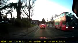 Car mounts pavement driving on Greater London road