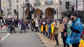 'No Christmas on a dead planet!' climate activist exclaims as Youth Climate Swarm block traffic at Piccadilly Circus