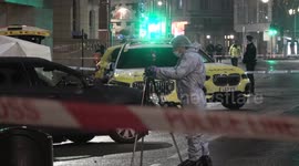 Forensics officers search scene after man shot dead by police near Kensington Palace, London