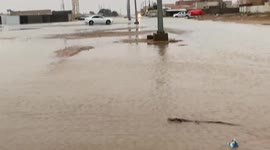 A car driving on a road without sewers